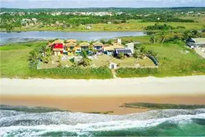 condominio inteiro a venda, estrutura frente mar - 20 minutos do aeroporto internacional de salvador