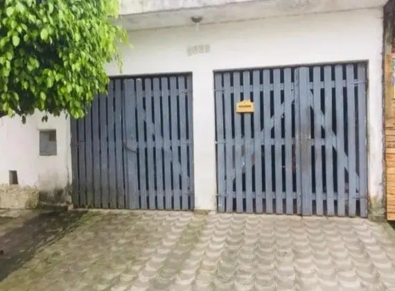 Vendo casa com suite garagem e quintal na praia grande