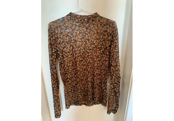 Blusa tulê transparente