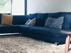 Sofá Líder com chaise e almofadas