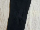 calça semi nova, rasgada no joelho tamanho