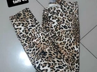 Calca jeans oncinha