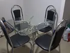 mesa de vidro com 4 cadeiras