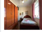 Cama casal em madeira
