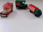 Miniaturas de caminhões da Coca Cola antigos
