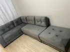 Sofá de canto com puff