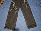 Calça com raios bordados